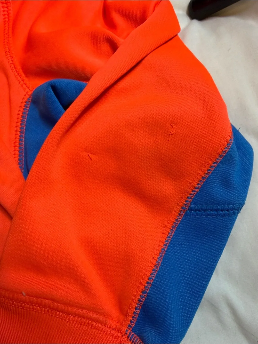 Nike Kids Orange Hoodie with Blue Swoosh and Trim